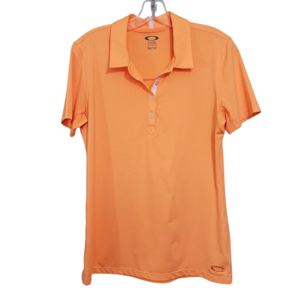 Oakley bright orange golf 1/4 button short sleeve polo shirt woman's size medium